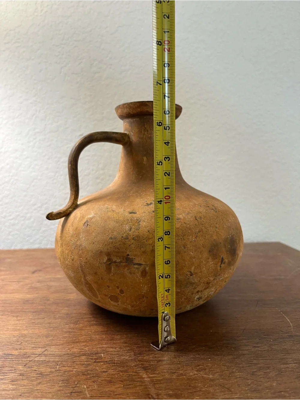 Antique distressed metal jug